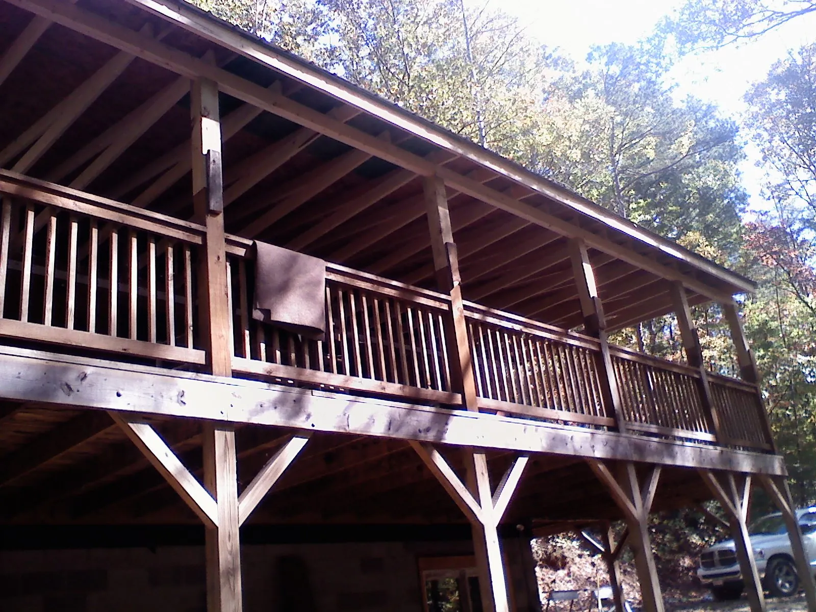 Timber framing under a new elevated porch and deck — Roof Leak Repair in Wenatchee by Roofing Brothers